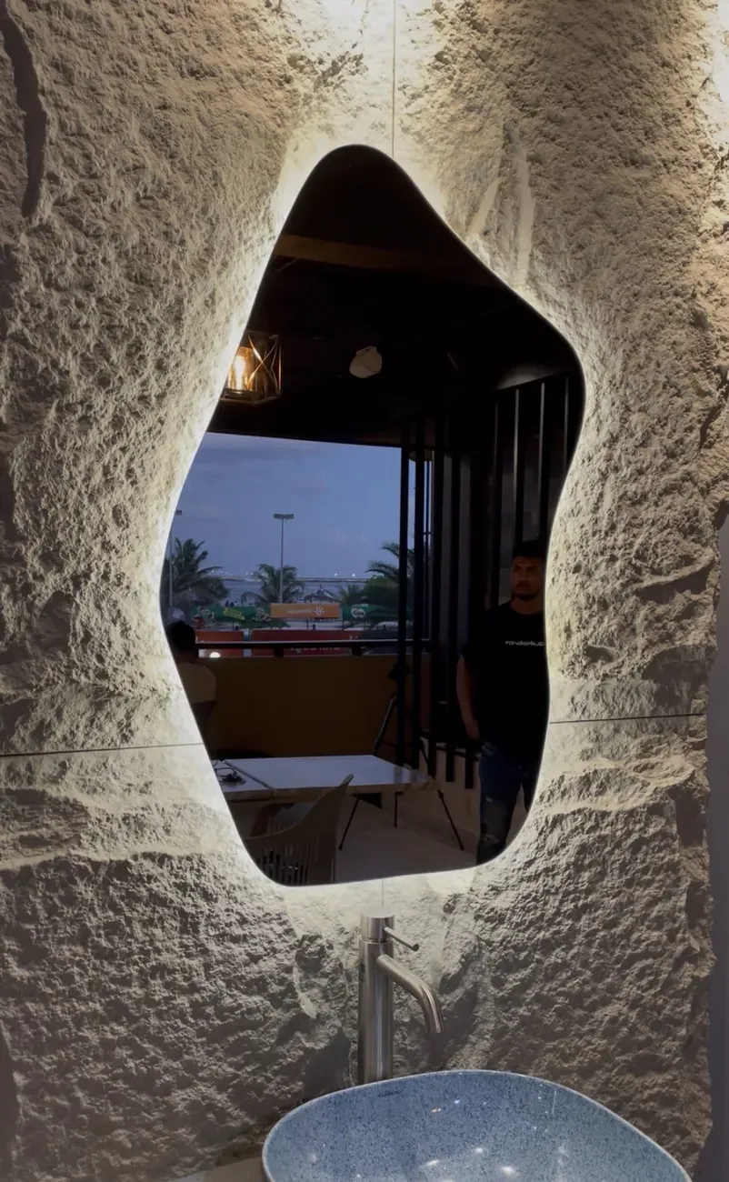 Custom mirror installation in a Maldives resort interior